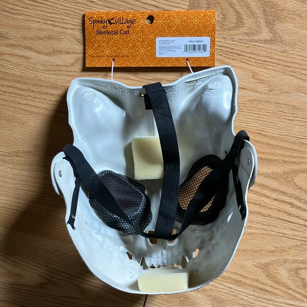 White and Black Face Mask with Skull Design